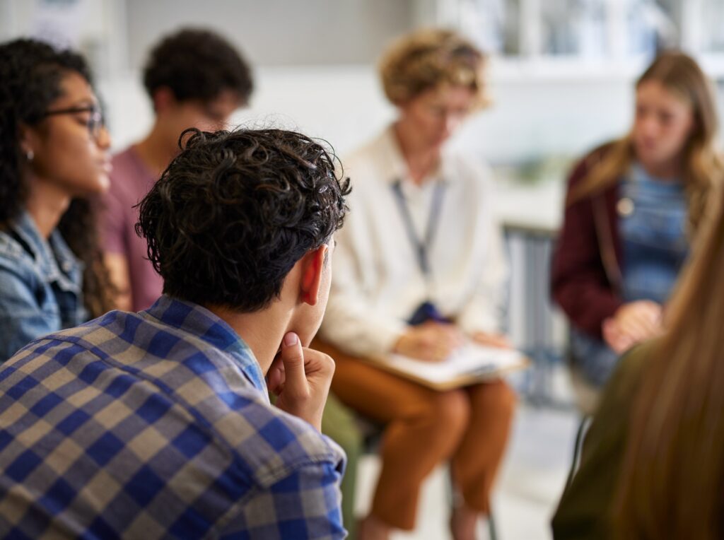 Counseling group session with teens at school