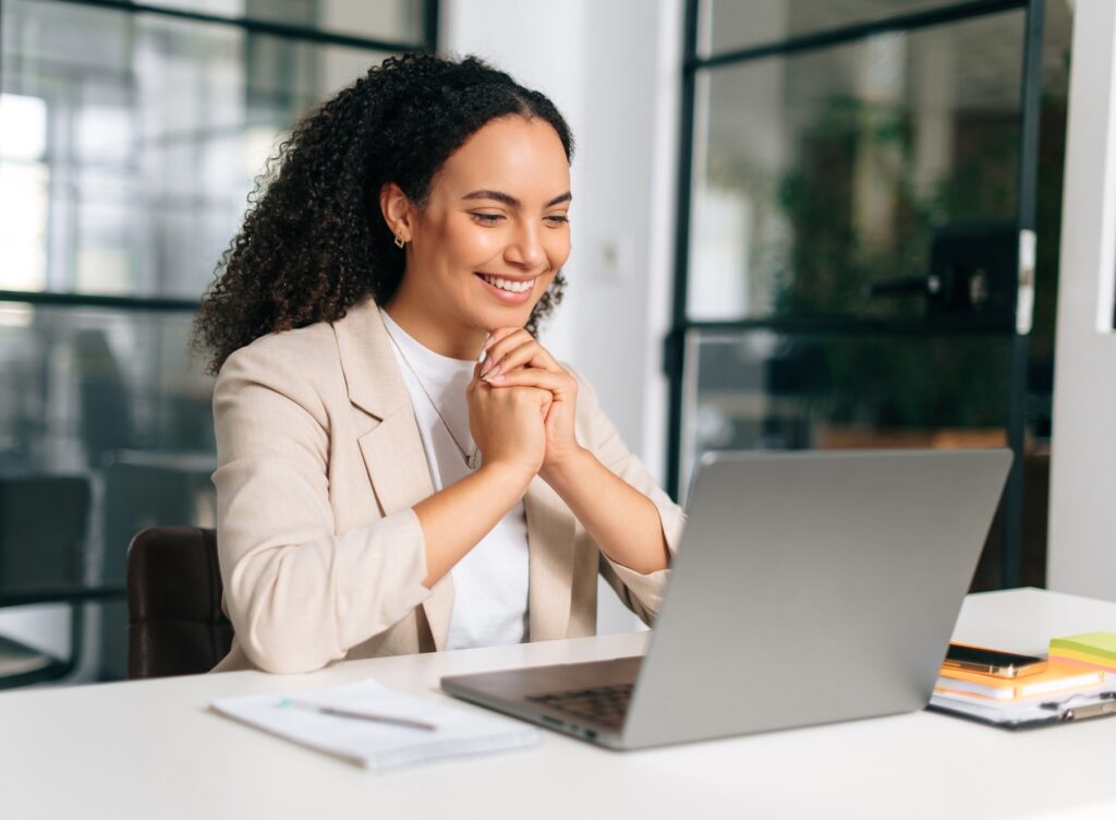 Positive brazilian or hispanic curly haired business woman, company ceo, recruitment manager